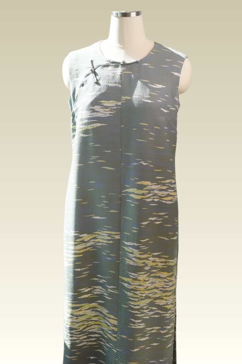 Light floral Qipao on a dress form