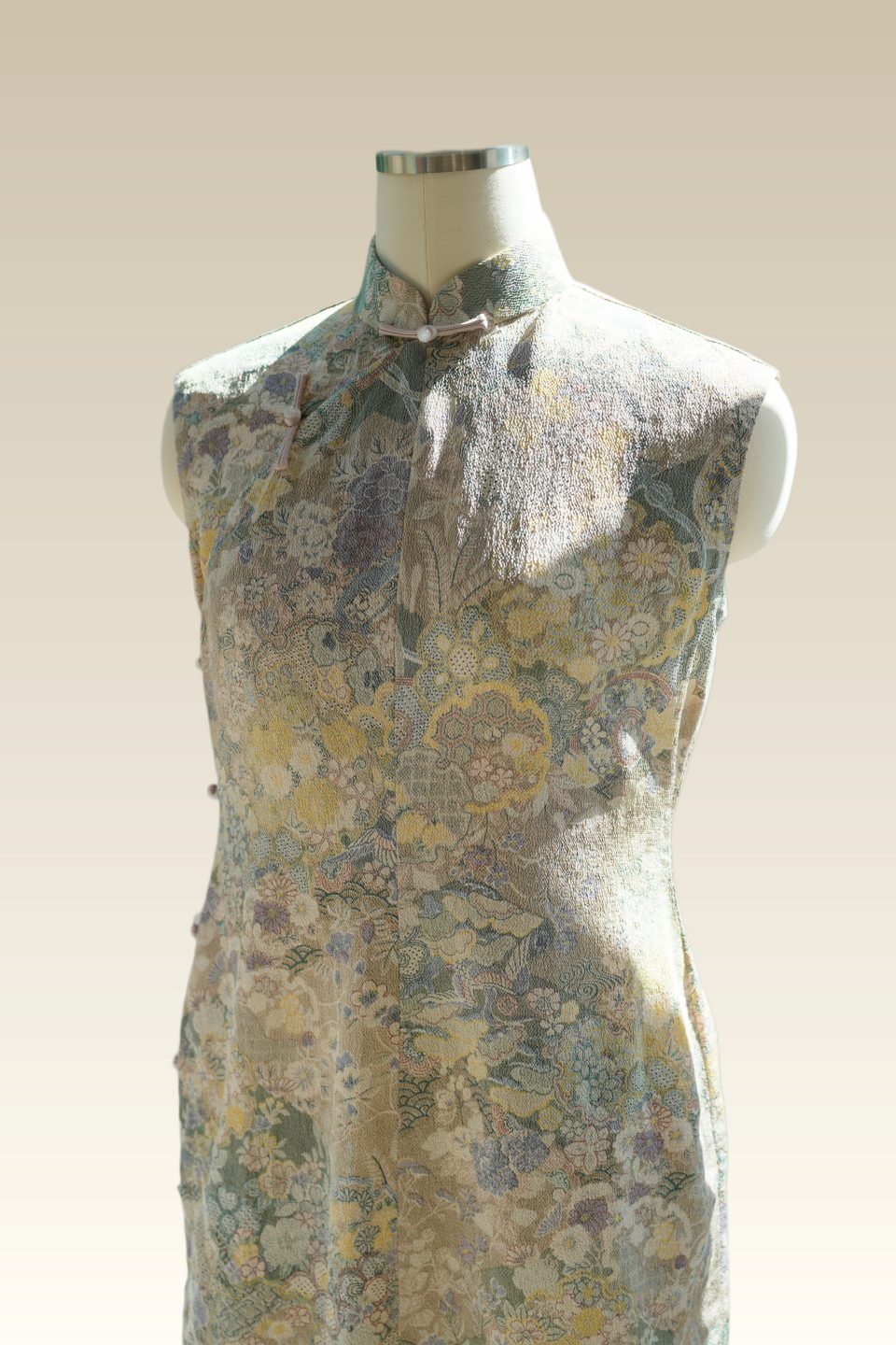 Sleeveless Qipao in celestial Tenmoku inspired hand-illustrated Chirimen silk with lilac frog buttons